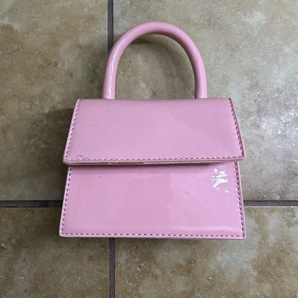 Used bubblegum pink mini purse